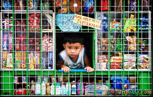 filipino kid,sari sari store,manila streets,philippines