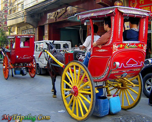 kalesa calesa on manila streets,manila streets,philippines,kalesa