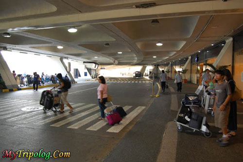 passengers exiting the naia,manila airport,manila,terminal building 1,philippines