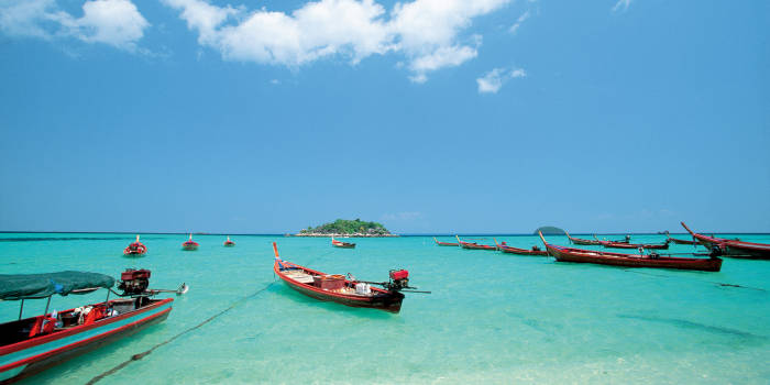 boating on crystal clear caribbean water of the barbados island