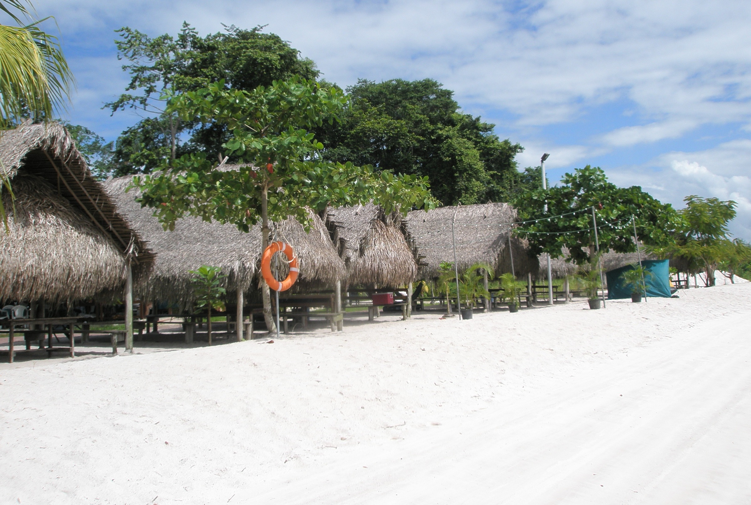 Suriname white beach and huts