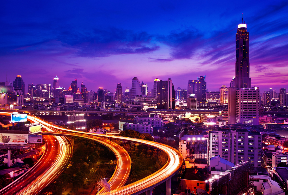 Traffic in modern city at night, Bangkok Thailand